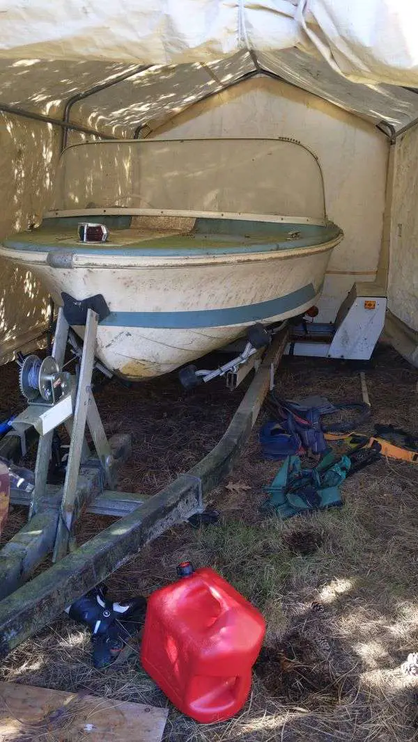 14 ft 67 Larson hand built Will not part boat from trailer ...