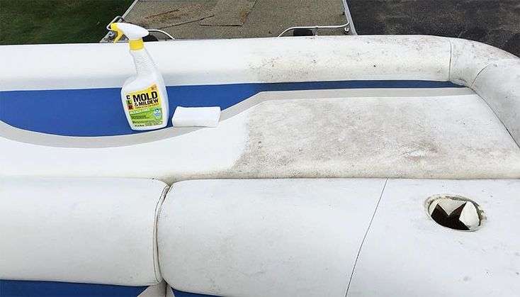cleaning the boat with the spray