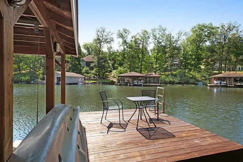 Spacious lakefront home w/ boat dock, fire pit &  pool table